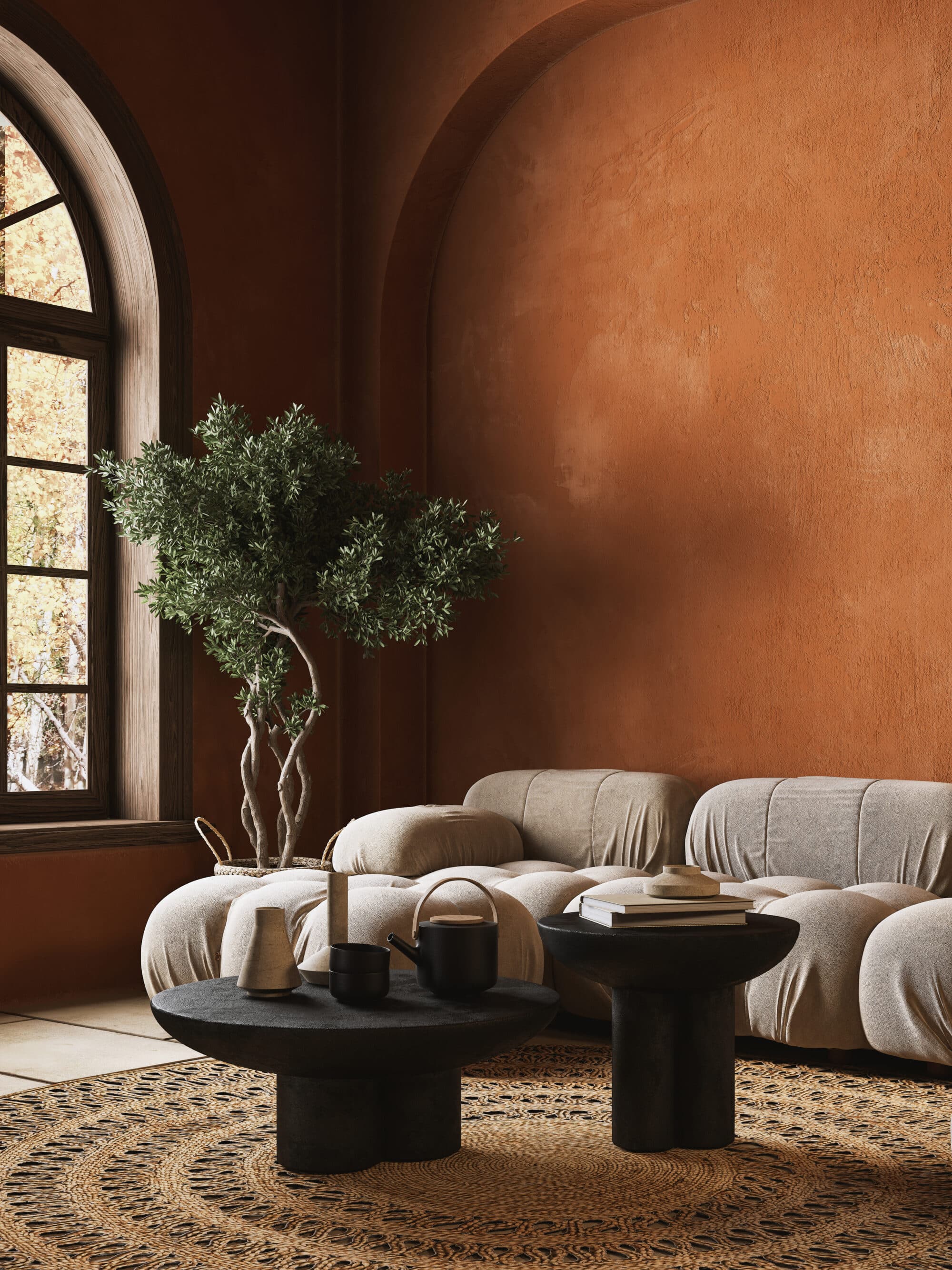 Salon chaleureux avec canapé beige et mur terracotta, décoration d'intérieur à Montpellier